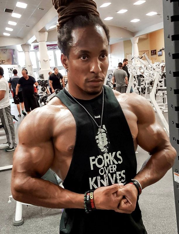 Vegan competitive bodybuilder Torre Washington in gym