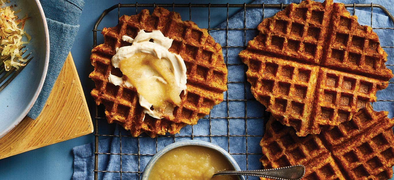 Crunchy Hash Brown Waffles with Applesauce on a black metal cooling rack