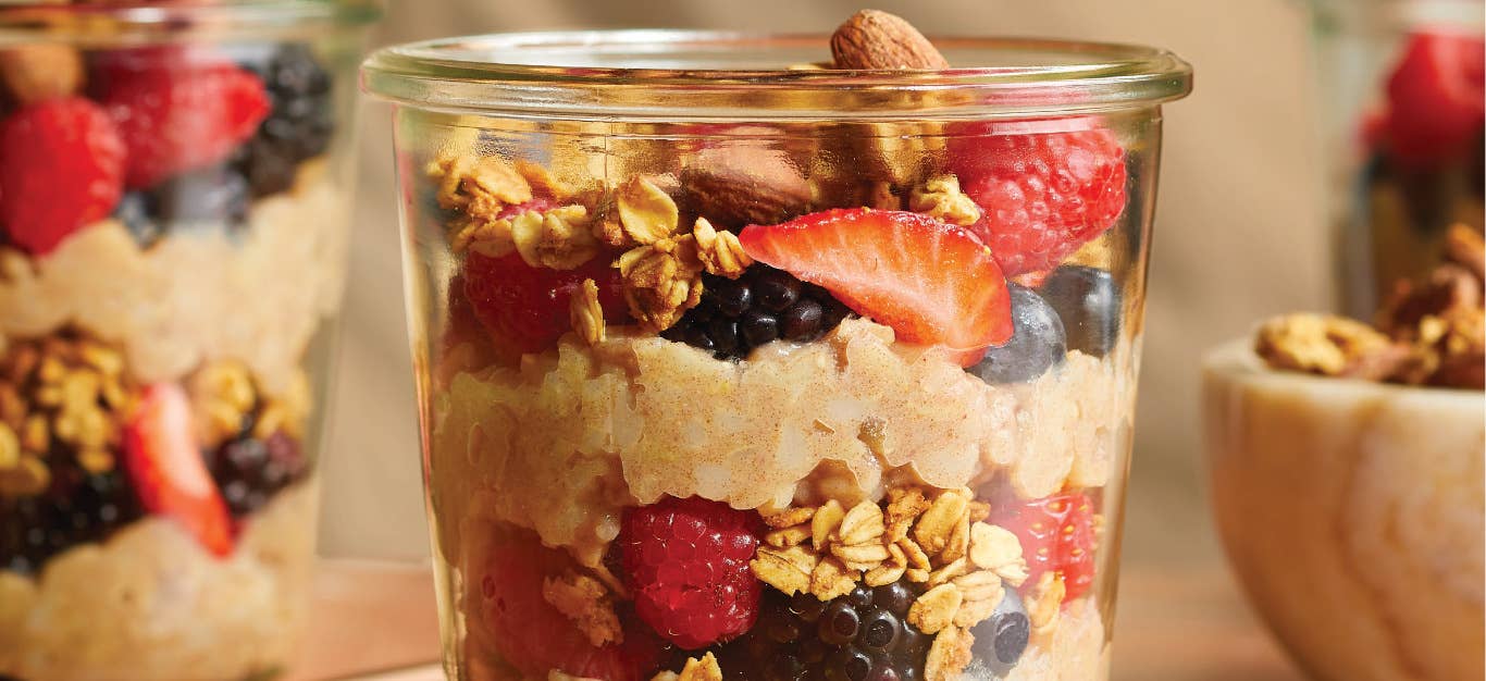 Close-up of three Granola Parfaits with Berries and Brown Rice Pudding