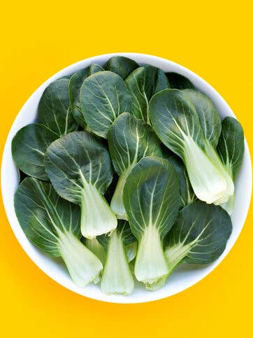 baby bok choy in a white bowl