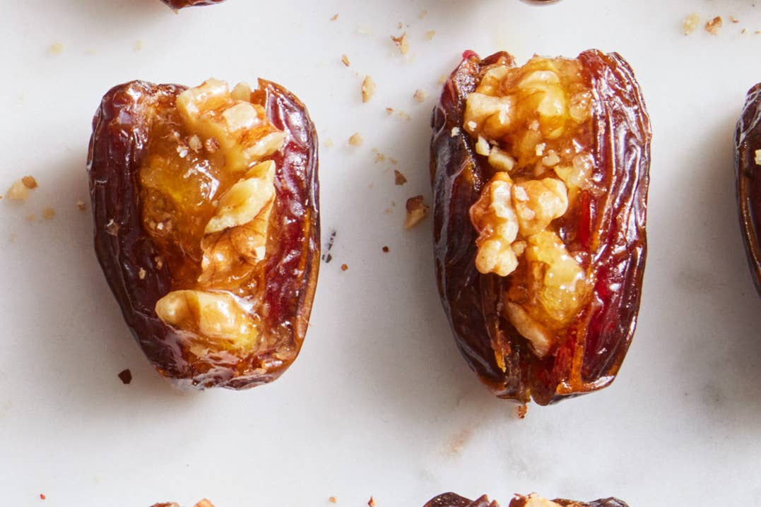 Two Medjool dates stuffed with walnuts and mango chutney