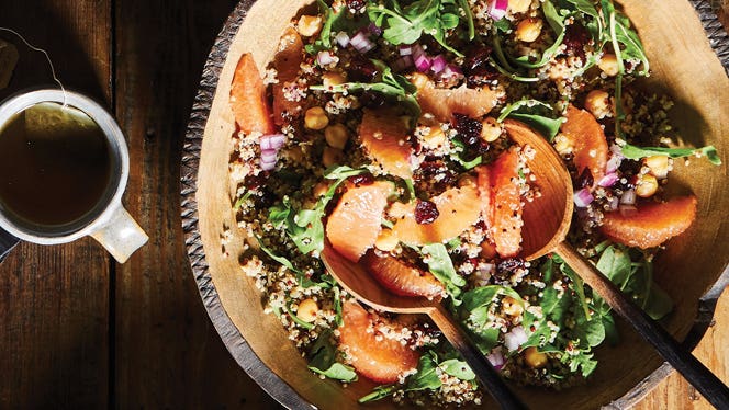 a citrusy salad with grapefruit, greens, and quinoa