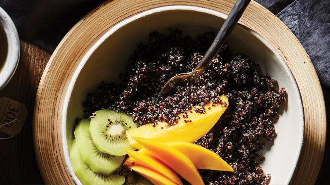 kiwi mango quinoa breakfast bowl