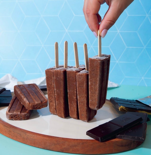 Dairy free choco fudge pops on a blue background - photo from Chef Bai cookbook Breaking Up with Dairy