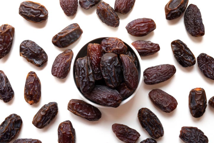 Medjool dates in a bowl on a table
