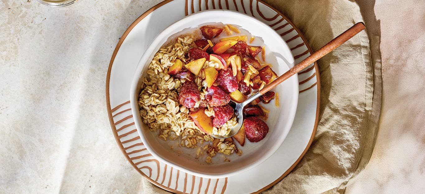 A bowl of Peach Raspberry Overnight Oats