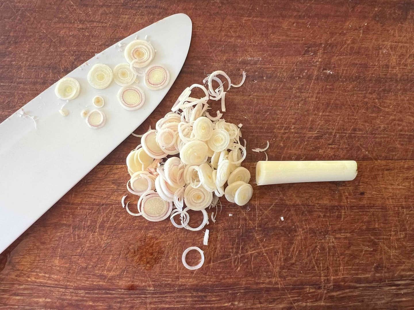 Sliced lemongrass on a cutting board