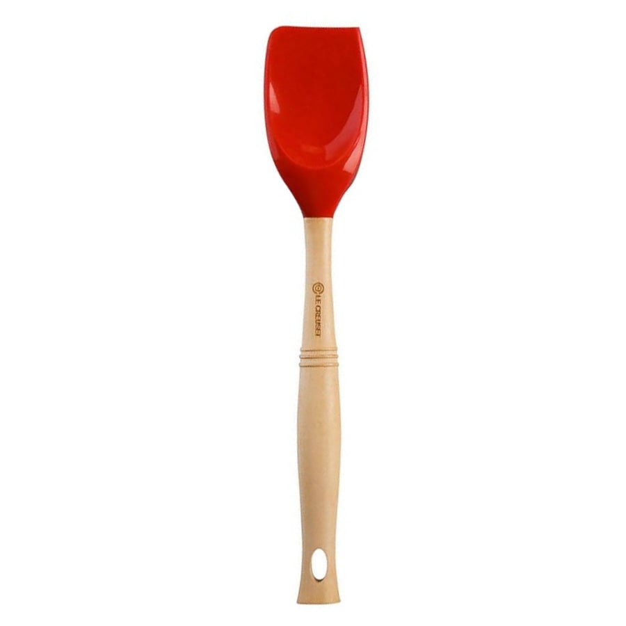 Le Creuset Silicone Spatula Spoon with a wooden handle and a red head