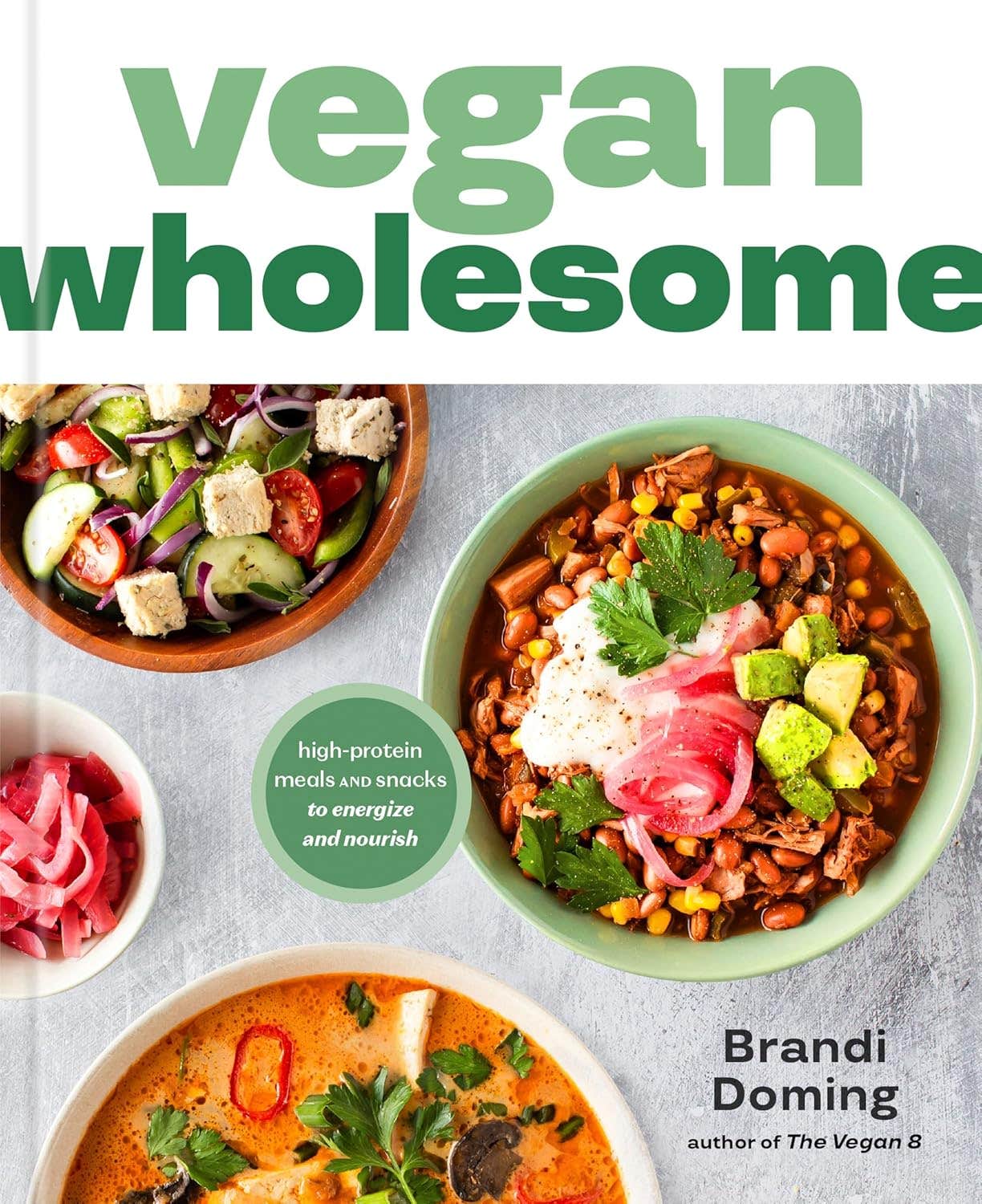 Cover of Brandi Doming's whole food plant based cookbook Vegan Wholesome