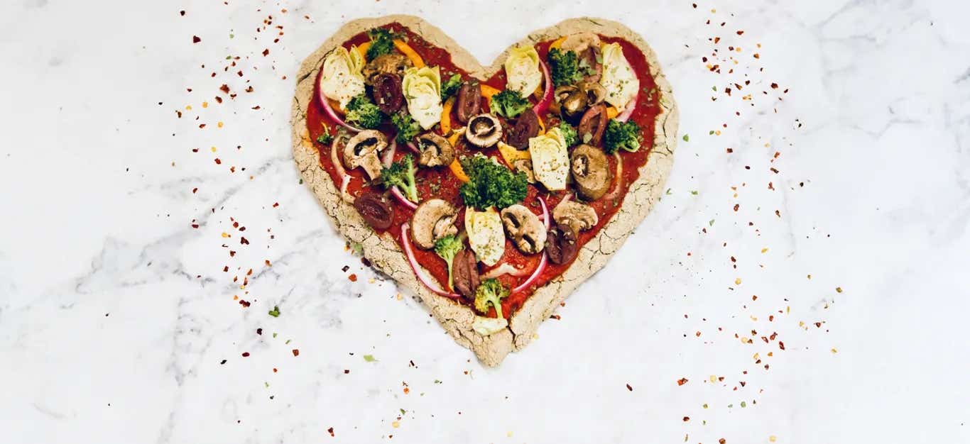 Heart-shaped gluten-free vegan pizza