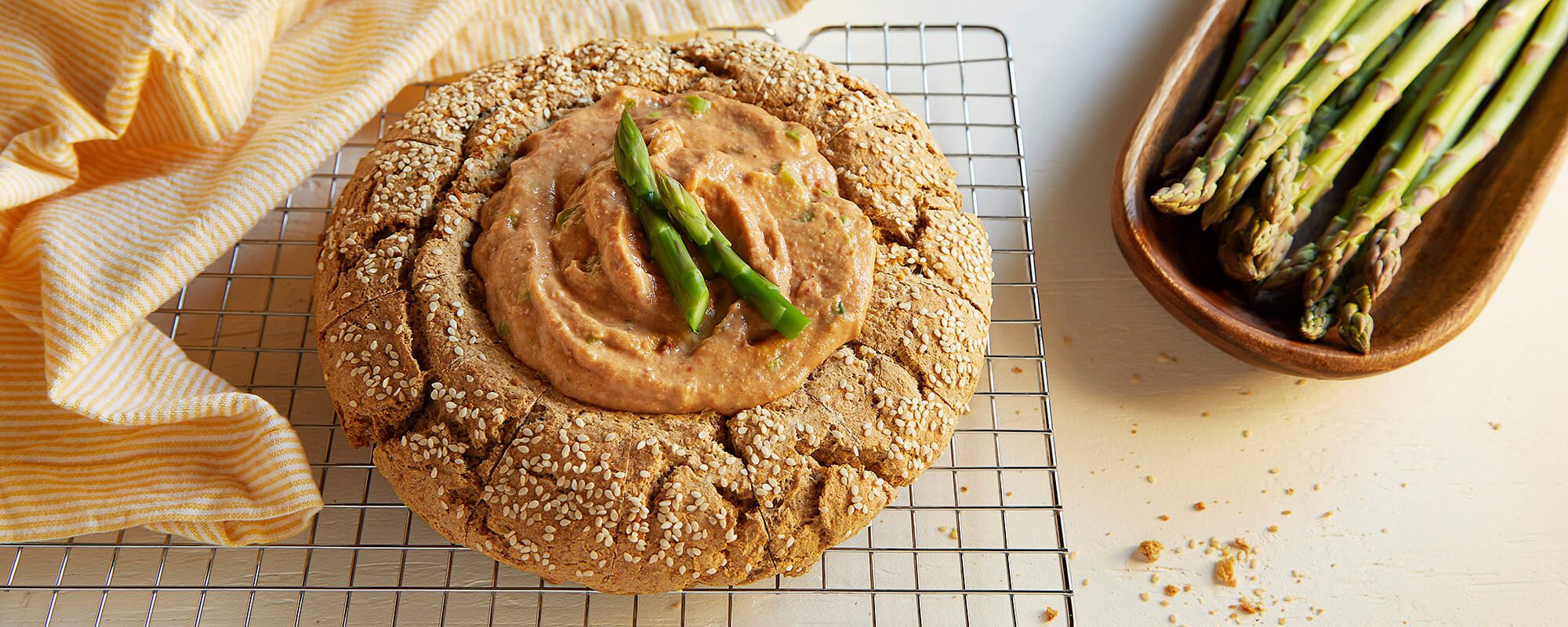 Rustic Bread Bowl with Sun-Dried Tomato and Asparagus Dip - Forks Over Knives