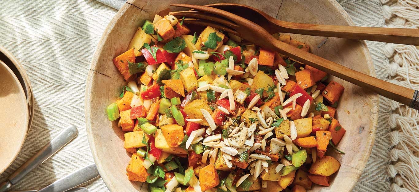 Harissa-Roasted Potato Salad in a wooden bowl