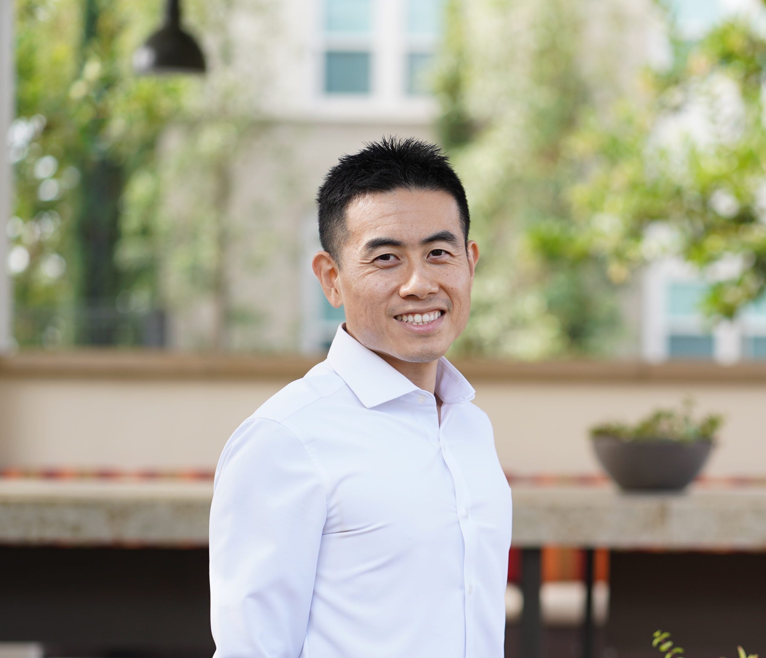 A headshot showing Micah Yu, MD, a rheumatologist in Southern California