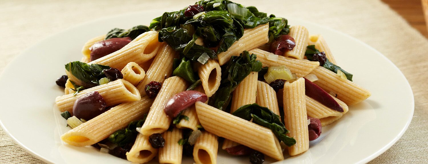 Penne with Swiss Chard, Olives, and Currants - Forks Over Knives