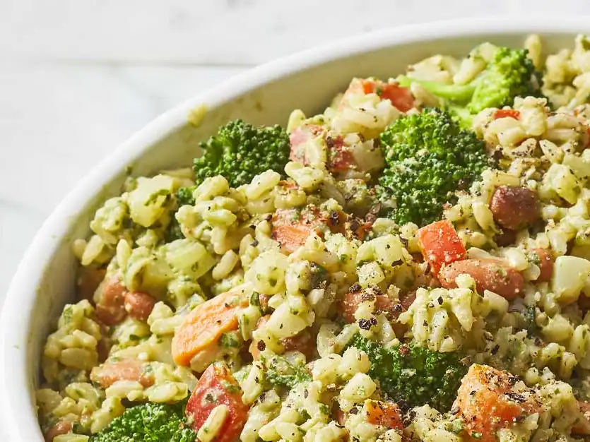 Vegan pesto cauliflower rice bowl with vegetables