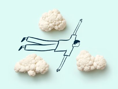 cartoon man flying through clouds of cauliflower
