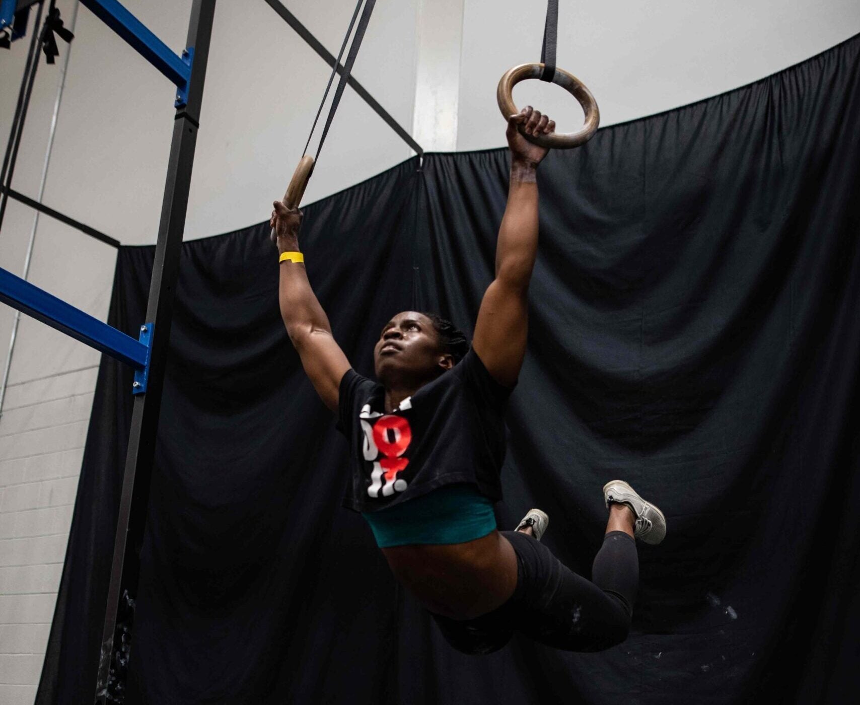 Vegan CrossFit athlete Briana Jones trains on gymnastic rings