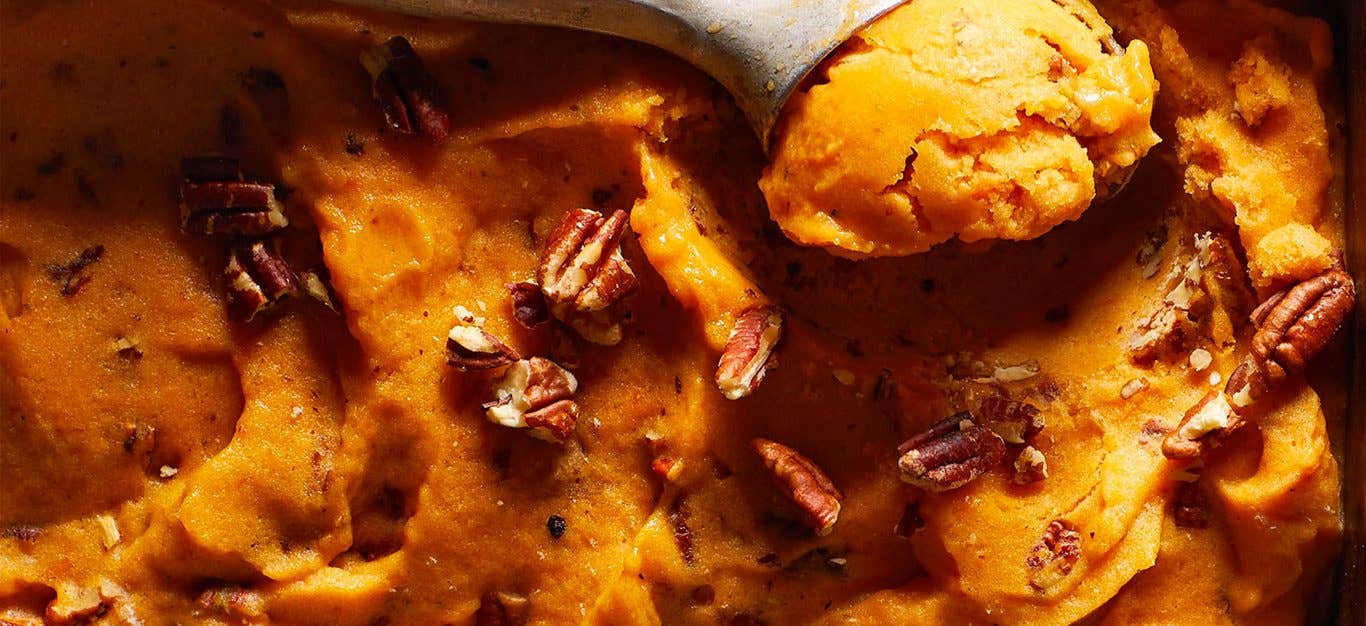 Close up of Butternut-Pecan Nice Cream with an ice cream scoop