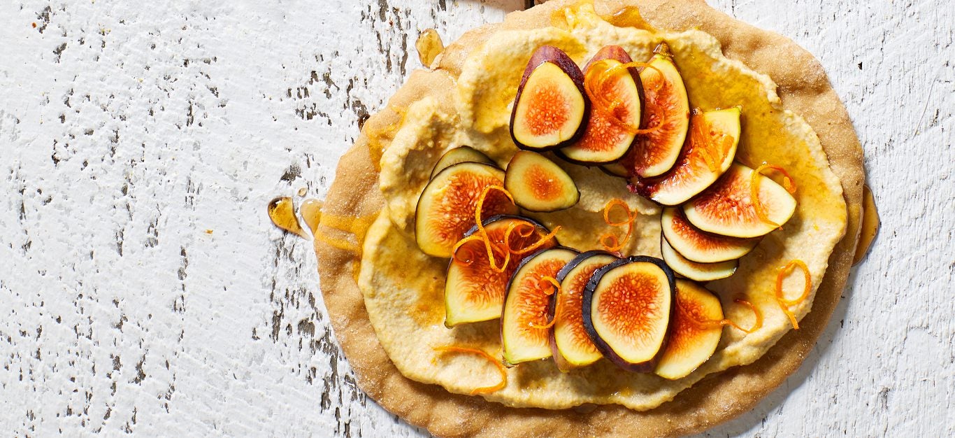Fig Flatbreads on a white marble countertop