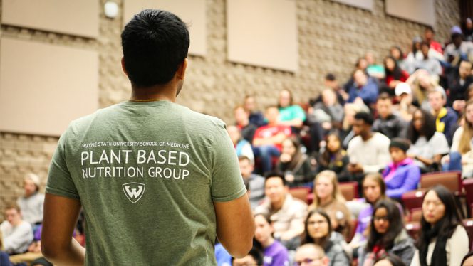 a man with a shirt that says 