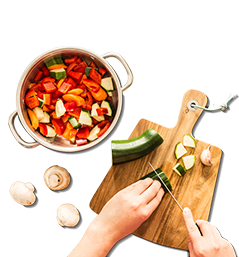 Woman prepping vegetables for Cooking Course