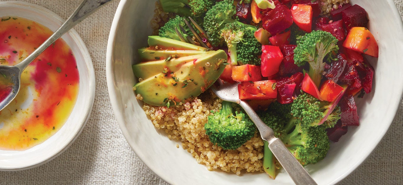 Quinoa Broccoli Bowls with Roasted Beets in white bowls