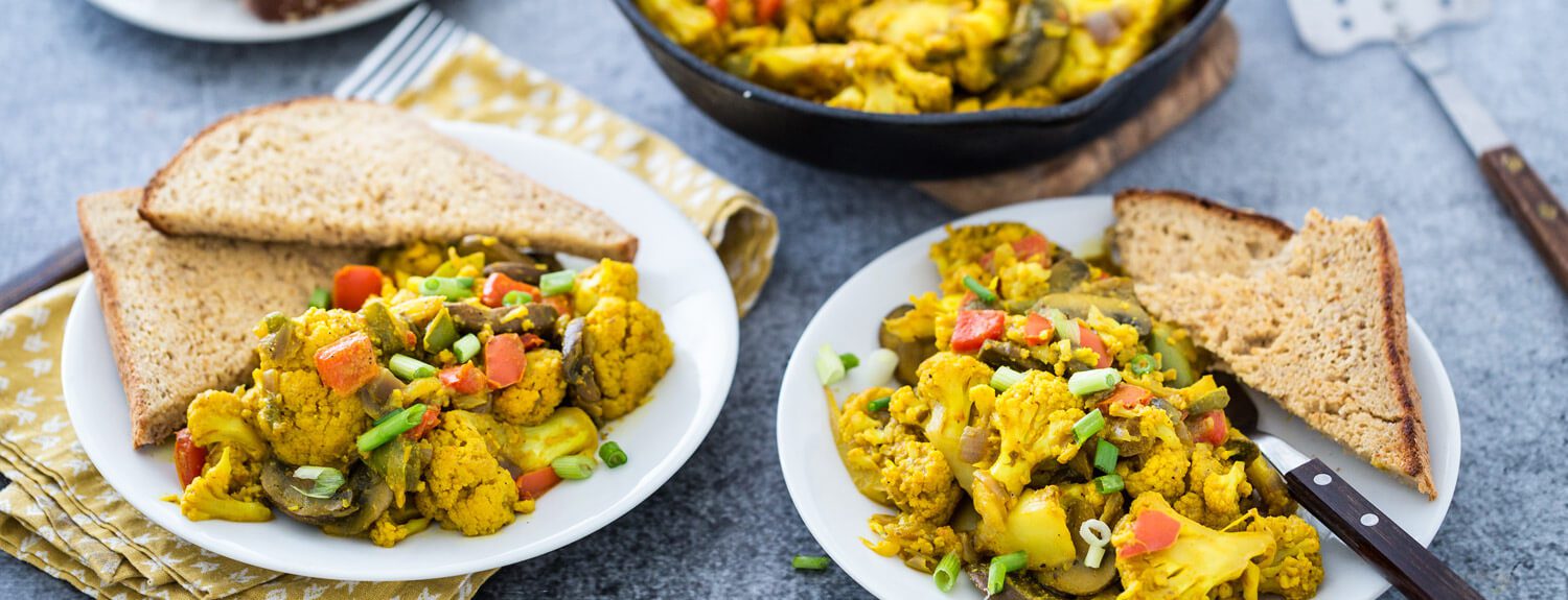 There are many good recipes for scrambles, but most call for tofu. In this vegan scrambled eggs recipe, cauliflower takes it's place—with delicious results.