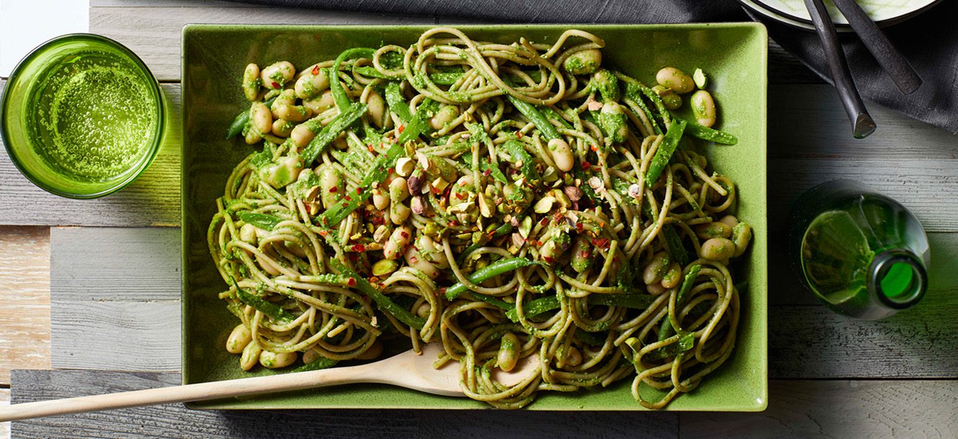 Green Bean Pasta Dish - A Platter of green beans and pasta in a creamy pesto sauce