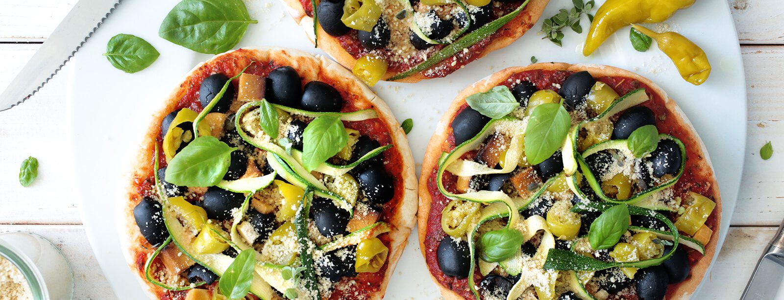 Simple Vegan Pita Pizzas - Forks Over Knives