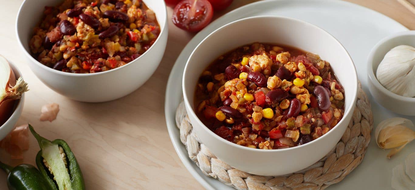 tempeh chili - red chili with beans, corn, crumbled tempeh