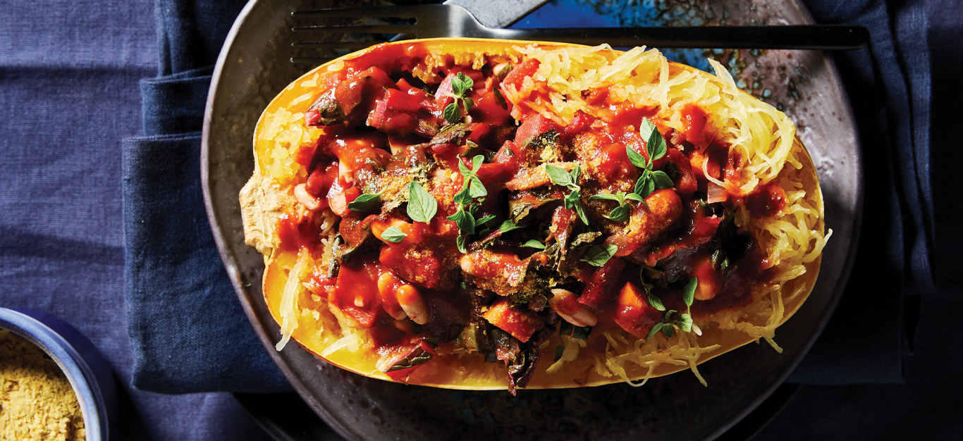 Spaghetti Squash Boats with White Beans and Swiss Chard