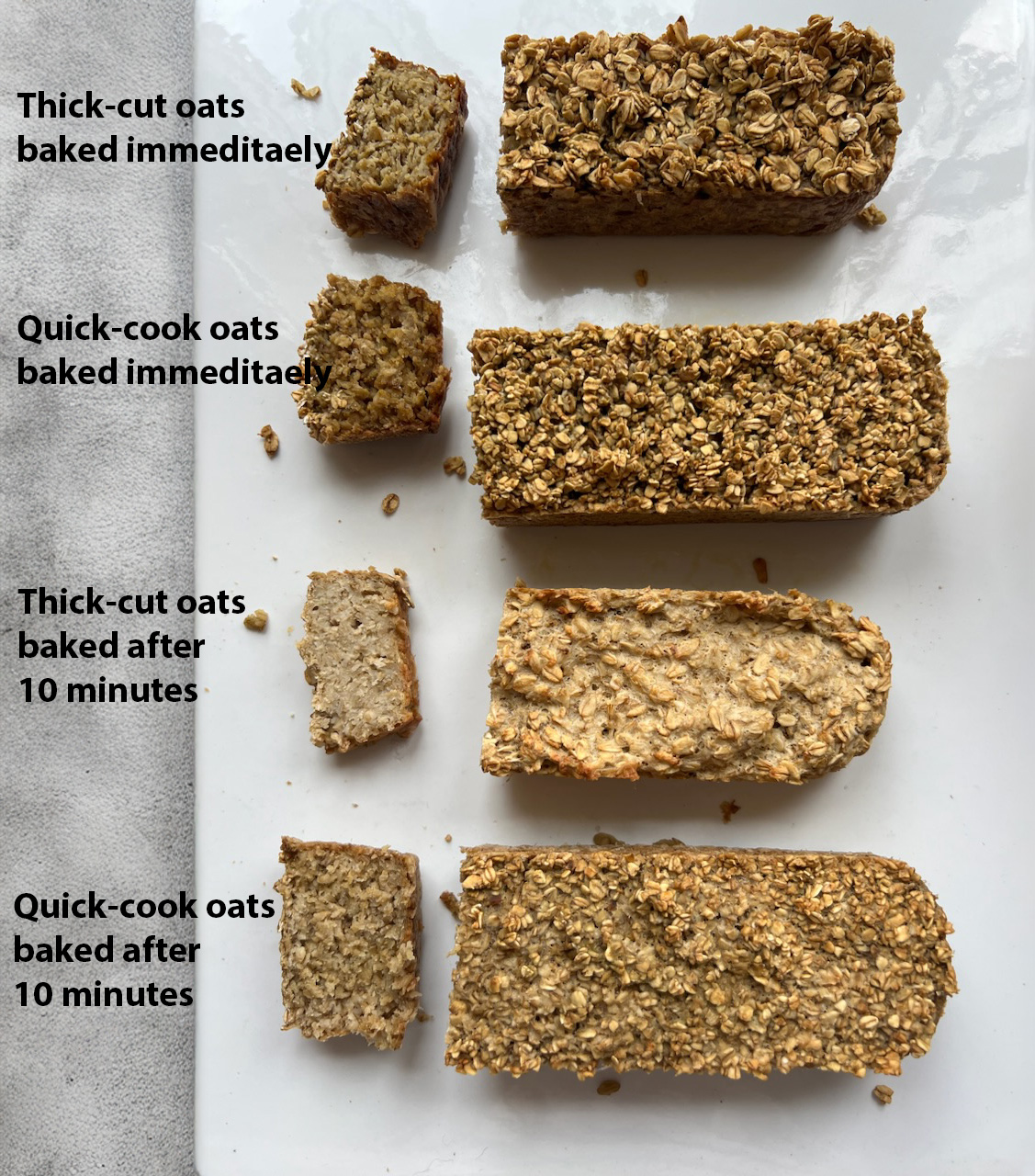 Four small loaves of Irish Porridge Bread with one slice cut off, showing how the loaf turned out when thick cut oats were used compared with quick-cook oats.