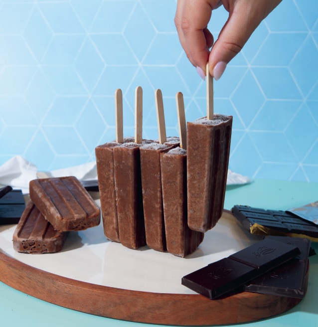 Dairy free choco fudge pops on a blue background - photo from Chef Bai cookbook Breaking Up with Dairy