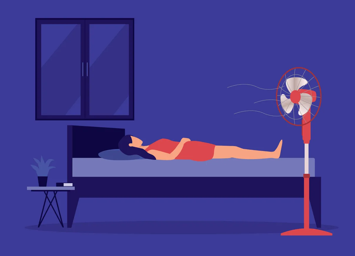 Illustration of woman lying in bed on top of covers with the fan on to combat hot flashes. Deep purple background, lighter figure in an orange dress.