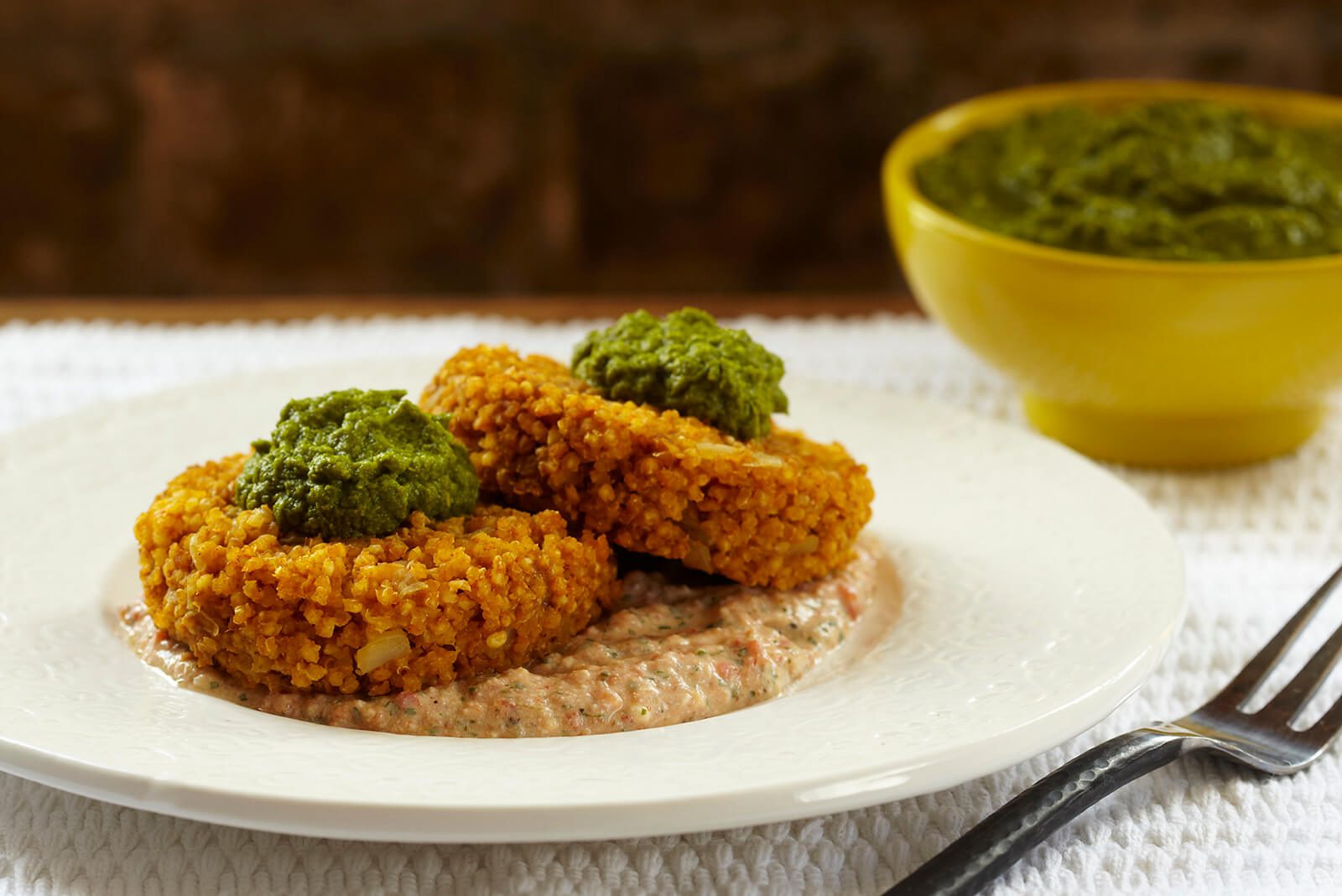 Curried Millet Cakes with Red Pepper Coriander Sauce