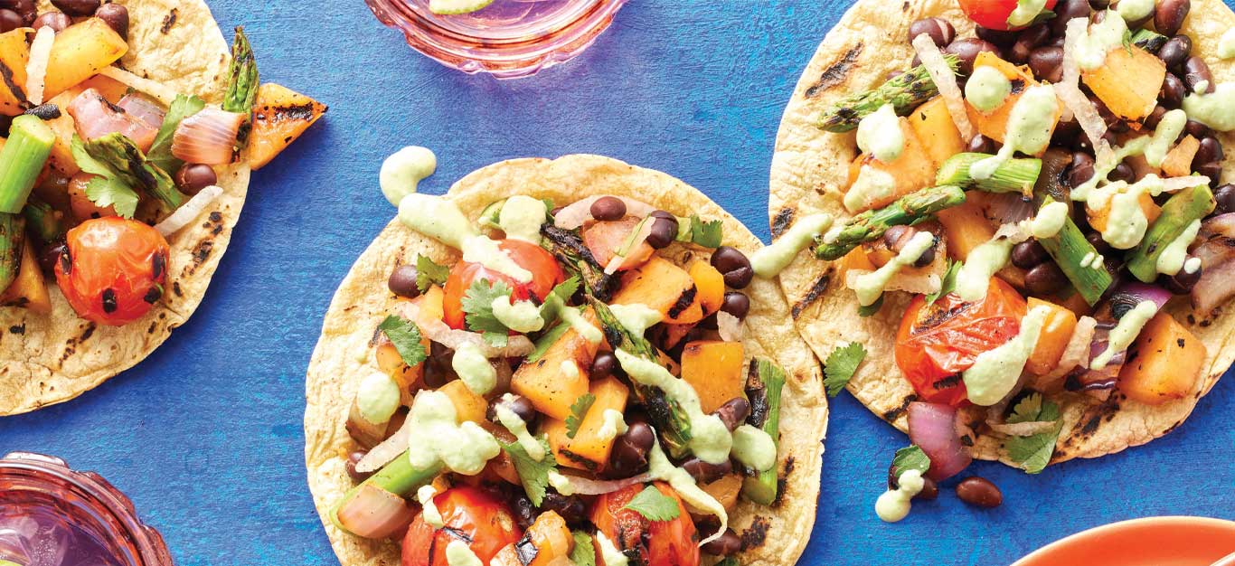 Grilled Melon and Black Bean Tostadas on a blue table