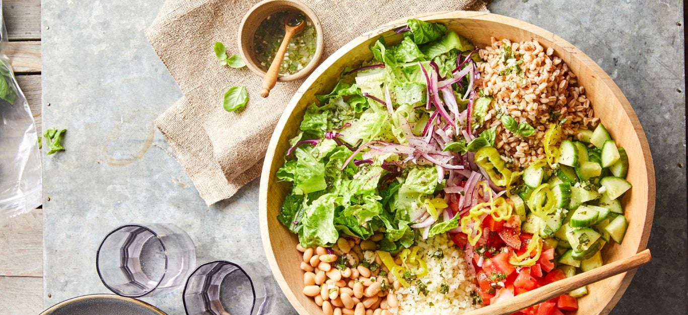 Italian Chopped Salad with Farro in a wooden bowl