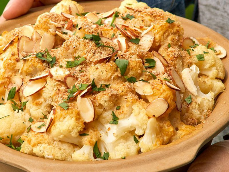 Creamy White Cauliflower Side Dish Topped with Almonds, Bread Crumbs
