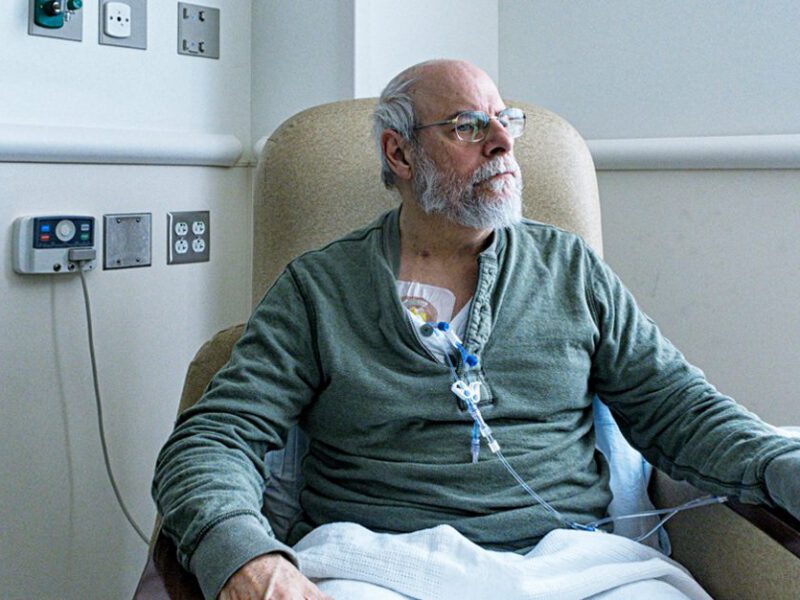 A man hooked up to chemotheraphy
