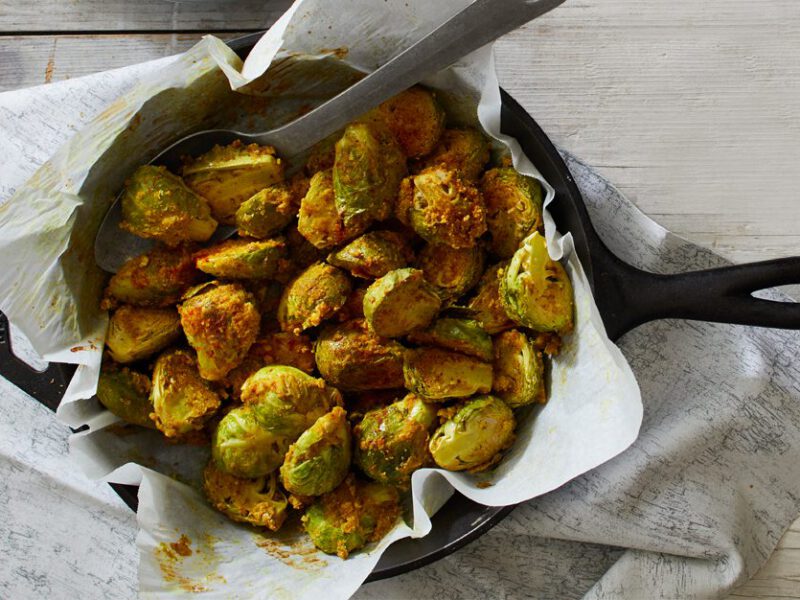 Spicy Roasted Brussels Sprouts in a cast iron skillet