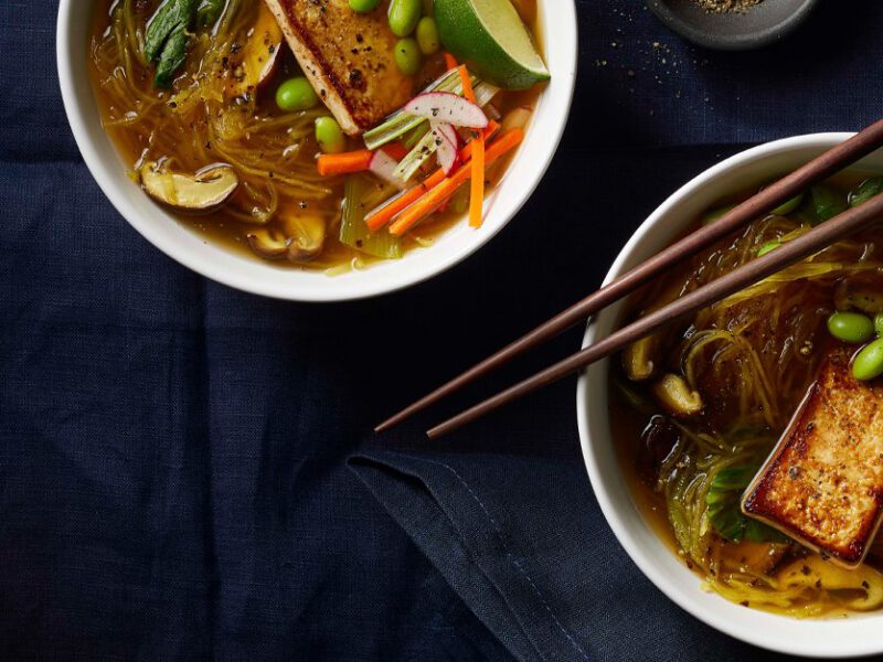 Spaghetti Squash Pho in two white bowls with chopsticks