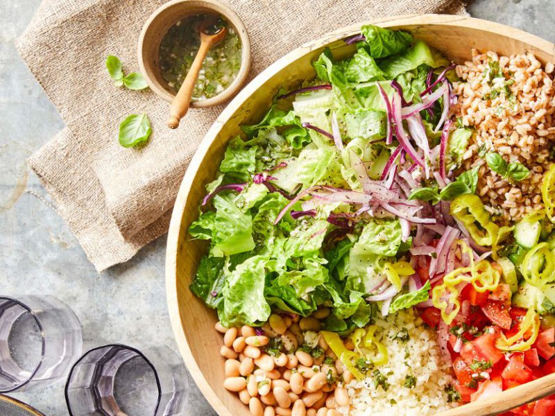 Italian Chopped Salad with Farro in a wooden bowl