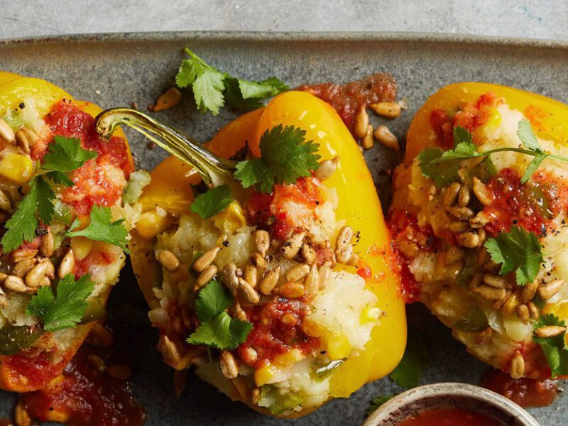 Yellow Bell Pepper Boats with Homemade Hot Sauce on a gray tray
