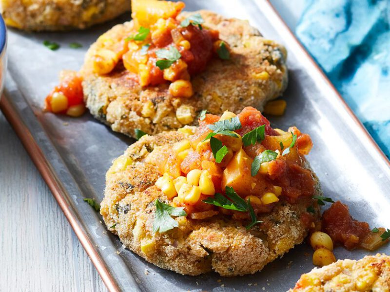 Chickpea and Corn Fritters with Tomato-Corn Chutney on a white platter
