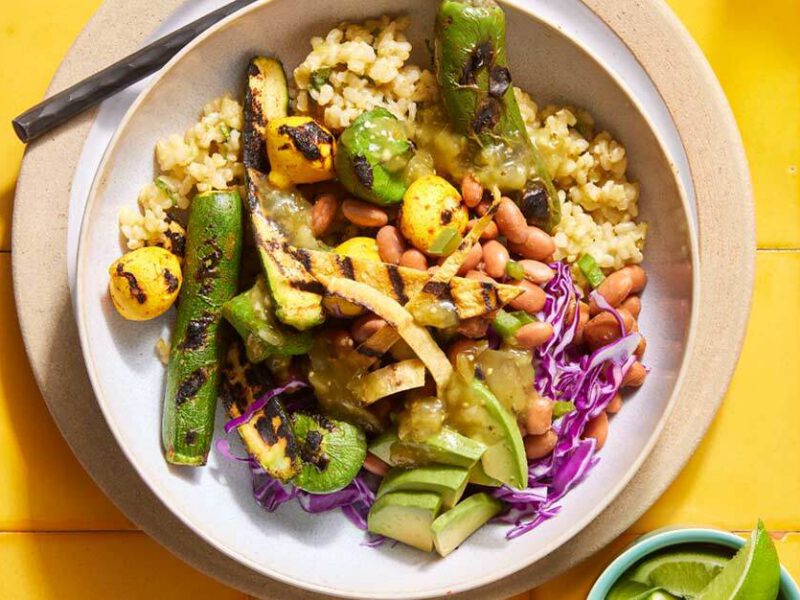 Baja Rice Bowls with Grilled Summer Squash on a yellow tile table