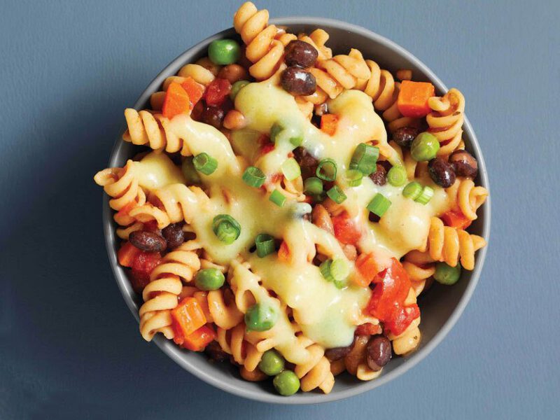 Creamy Vegan Chili Mac in a bowl against a light gray background