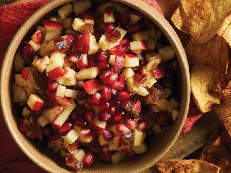 Apple Salsa with Cinnamon Tortilla Chips on a wood cutting board