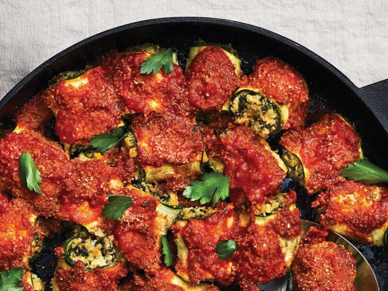 Zucchini Rollatini with Quinoa and Chickpeas in a cast iron skillet