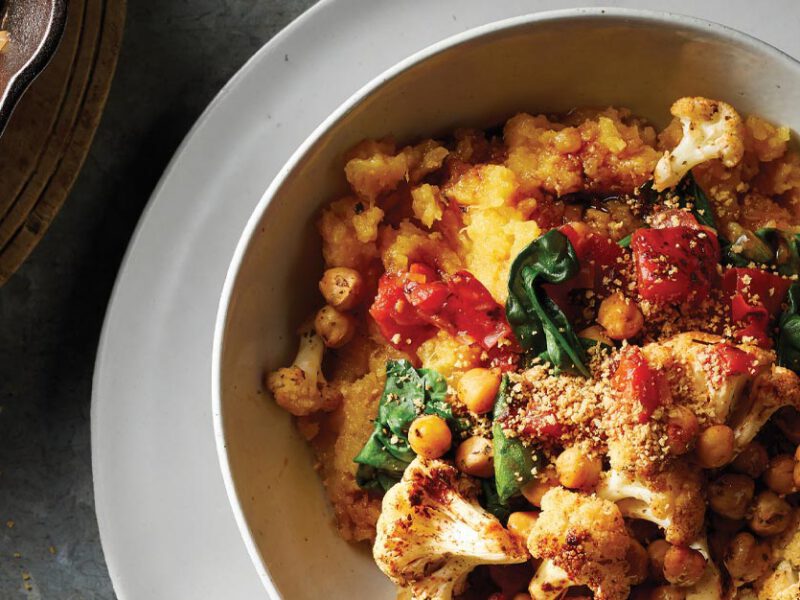 Mashed Rutabaga with Italian Roasted Cauliflower and Chickpeas in a white ceramic bowl