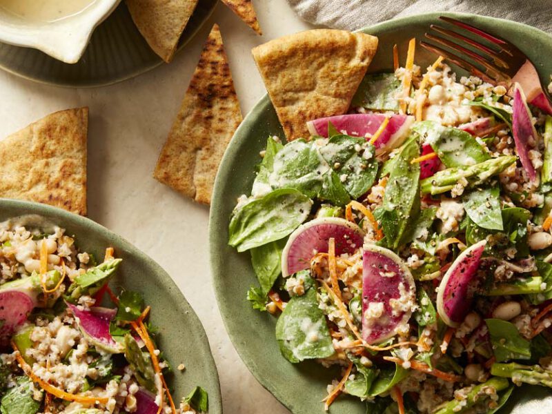 Spinach Tabbouleh Salad with Watermelon Radish on green ceramic plates